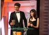 Max Irons (Red Riding Hood) and Felicity Jones (Cemetery Junction) present the BAFTAs for Sound and Editing. (Pic: BAFTA/ Stephen Butler)