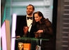 Tom Ford (director, A Single Man) and Eva Green (Casino Royale) announce Inception and Bronson star Tom Hardy as the Orange Wednesdays Rising Star. (Pic: BAFTA/ Stephen Butler)