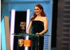 Julianne Moore (The Kids Are All Right) announces the Adapted Screenplay winner. (Pic: BAFTA/ Stephen Butler)