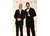 Guy Pearce stands with Sheldon Turner after presenting him with the Adapted Screenplay award (BAFTA/Richard Kendal).
