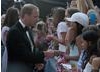 Fans who crowded outside the Belasco Theatre in LA were rewarded with a hand shake from the the Royal couple