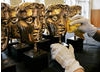 BAFTA masks are polished before the British Academy Television Awards.