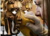 BAFTA masks are polished.