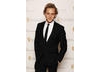 Tom Hiddleston, star of five-time nominated series Wallander, arrives on the red carpet to present the Visual Effects Award (BAFTA / Richard Kendal).