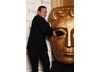 Jason Isaacs has run-in with the BAFTA mask (BAFTA / Richard Kendal).