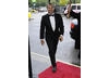 TV presenter Michael Underwood arrives on the red carpet to support partner Angellica Houston as she films for bafta.org (BAFTA / Richard Kendal).