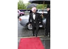 Writer and comedian Hardeep Singh Kohli, presenter of the Editing Fiction/Entertainment category at this year's Awards, arrives on the red carpet (BAFTA / Richard Kendal).