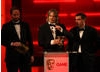 Mark Healey, David Smith and Pete Smith accept the BAFTA for Game Innovation.