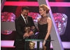 Paddy McGuinness and Cat Deeley announce the winner of the Continuing Drama category.