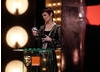 Sandy Powell makes her acceptance speech after winning the award for Costume Design for The Young Victoria (BAFTA/Brian Ritchie).