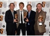 David Sproxton, citation reader Alex Pettyfer, Nick Park and Steve Box celebrate their Feature Film win for Wallace and Gromit The Curse of the Were-Rabbit