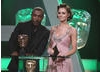 Kara Tointon and Ashley Walters step up to present the Drama Serial award.
