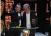 Comedy duo Harry Enfield and Paul Whitehouse celebrate winning the Comedy Programme award for their eponymous sketch show Harry & Paul (BAFTA / Marc Hoberman).