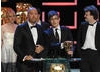 Jamie Isaacs, Henry Beney and Rob McCabe took to the stage with choirmaster Gareth Malone to collect the Features award for their documentary following a boys school choir in Lancaster (BAFTA / Marc Hoberman).