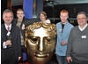 BAFTA Mentors John McShane (left) and Jerry Brannigan (right) with young scriptwriters from Glasgow Youth Film Festival.