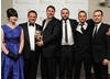 Presenter Ben Price with the winning visual effects team from The Mill, who were also nominated for Doctor Who but won for Merlin. (Pic: BAFTA/Chris Sharp)
