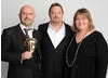 Presenter Eddie Izzard with CBBC's Cheryl Taylor and Damian Kavanagh.