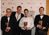 Gavin Raeburn, Clive Moody and Ralph Fulton received the Sport Award for Race Driver: GRID from Olympic swimmer Mark Foster (BAFTA / James Kennedy). 
