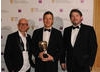 TV presenter and children's author Jason Bradbury and Archer Maclean, legendary programmer and founder of Awesome Play Ltd, presented the Technical Achievement Award to Keith Ramsdale for Spore (BAFTA / James Kennedy). 