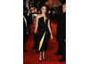 Angelina Jolie, Leading Actress nominee for Changeling, hit the red carpet wearing a striking Armani Prive gown with lemon lightening bolt alongside partner and Leading Actor contender Brad Pitt (BAFTA / Richard Kendal).