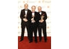 Nick Park, Bob Baker and Steve Pegrum collect the Best Short Animation for Wallace & Gromit: A Matter Of Loaf & Death.