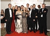 Citation readers Patsy Kensit-Healy and Adrian Lester with the cast of The Bill, winners of the Continuing Drama BAFTA at the British Academy Television Awards in 2009 (BAFTA/Richard Kendal).