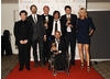 The IT Crowd team with citation readers Micheal McIntyre and Tess Daly celbrate their win in the Situation Comedy category for The IT Crowd (BAFTA/ Richard Kendal).