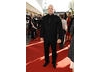 Double-BAFTA nominee Ross Kemp changed from his army combats to look dashing in an all-black Alexander McQueen suit (BAFTA / Richard Kendal).