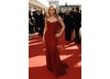 Holby City star Patsy Kensit-Healy dazzled the carpet crowds in red Dolce Gabbana dres with YSL shoes (BAFTA / Richard Kendal).
