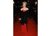 Sharon Stone, presenter of the BAFTA for Outstanding British Film, was radiant in red Galliano (BAFTA / Richard Kendal).