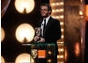 Duncan Jones makes an emotional acceptance speech after winning the award for Outstanding Debut by a British Writer, Director or Producer for his film Moon (BAFTA/Brian Ritchie).