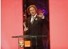 Anthony Dod Mantle accepts the Cinematography Award - the fourth of the night for Slumdog Millionaire (BAFTA / Marc Hoberman).