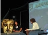 Gurinder Chadha and Alan Davies on stage at Latitude Festival 2008. 