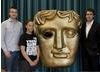 Harvey Elliott, VP & General manager of EA Bright Light with Actor Matthew Lewis and Chloe, a student from Walthamstow Academy. T-shirts for BAFTA Young Game Designers workshops were kindly supplied by Joystick Junkies. (Photography by Ed Miller)