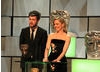 Jack Whitehall and Melissa George accepted Graham Norton's BAFTA Entertainment Performance in his absence.