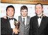 Presenter Barney Harwood with the winners behind the spectacular collection of mini games that triumphed in the Family category. (Pic: BAFTA/Steve Butler)
