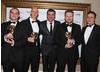 Presenter Joe Calzaghe with the winning team behind the fully immersive, ultra-realistic F1 2010. (Pic: BAFTA/Steve Butler)