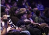 A young Merlin fan listens attentively to the demonstration of the show's music (BAFTA / Jonny Birch).