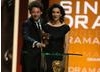 Luther's Indira Varma and Prince of Persia actor Richard Coyle present the award for Single Drama. (BAFTA/Steve Butler)