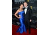 Mad Men's Jared Harris and actress Allegra Riggio strike a pose.