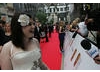 Kelly Osborne talks to reporters on the red carpet