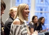 Laura Deeley reacts to some extra feedback after she's taken her seat.