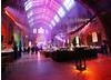 The Natural History Museum entrance hall is transformed with bright lights and decorations for the party (BAFTA/Richard Kendal).