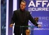 Culture Show presenter Mark Kermode awards the Dispatches team the Current Affairs BAFTA. (BAFTA/Steve Butler)