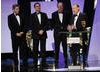 Andrew Marr collects the Specialist Factual Award at the British Academy Television Awards. 