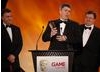 Piers Jackson, Mark Green and Leo Cubbin gratefully receive the award for best Handheld game: LittleBigPlanet (BAFTA/Brian Ritchie)