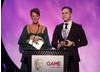 X Factor runner-up Olly Murs and GAME CEO Lisa Morgan present the GAME Award of 2009 as voted for by the British public (BAFTA/Brian Ritchie)