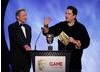 Comedian Dom Joly presents the award for best Strategy game along with Chris Deering, President of Sony Computer Entertainment Europe (BAFTA/Brian Ritchie)