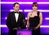 The Hollyoaks actress and Command & Conquer: Red Alert 3 voice artist teams up with Ben 'The Stig' Collins to present the first award of the evening. (Pic: BAFTA/Brian Ritchie)