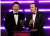 Watchdog’s Matt Allwright and games designer Jon Hare (Sensible Soccer) present the award for Use of Audio. (Pic: BAFTA/Brian Ritchie)